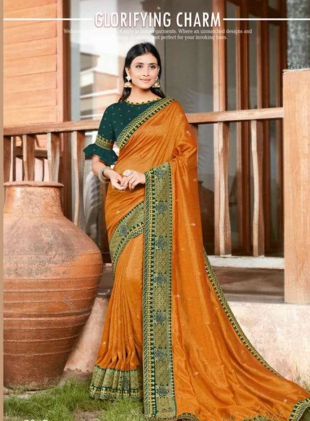Sangeeta Textiles Crystal Lichi Silk With Heavy Embroidery Work Exclusive Wedding Wear Sarees