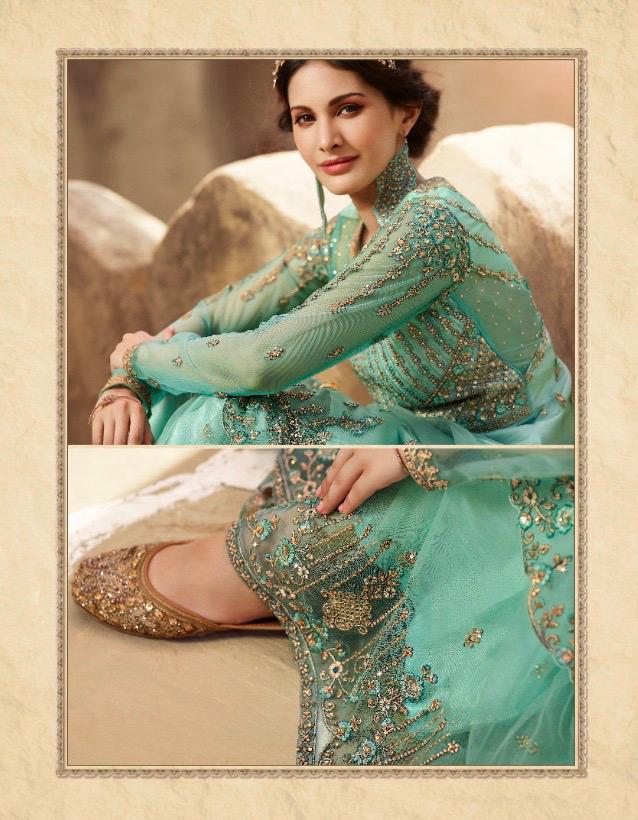 Glossy Simar Amyra Shaivi Net With Heavy Hand Work Stylish Designer Party Wear Salwar Suit